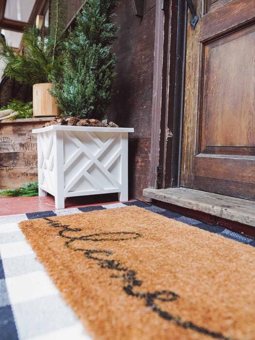 Welcome Mat on Screened in Porch with Winter Decor