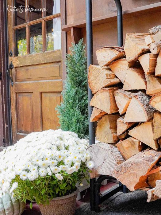 Wood Stacked on Back Screened in Porch for Fall time- Homemaking with Katie T's Home